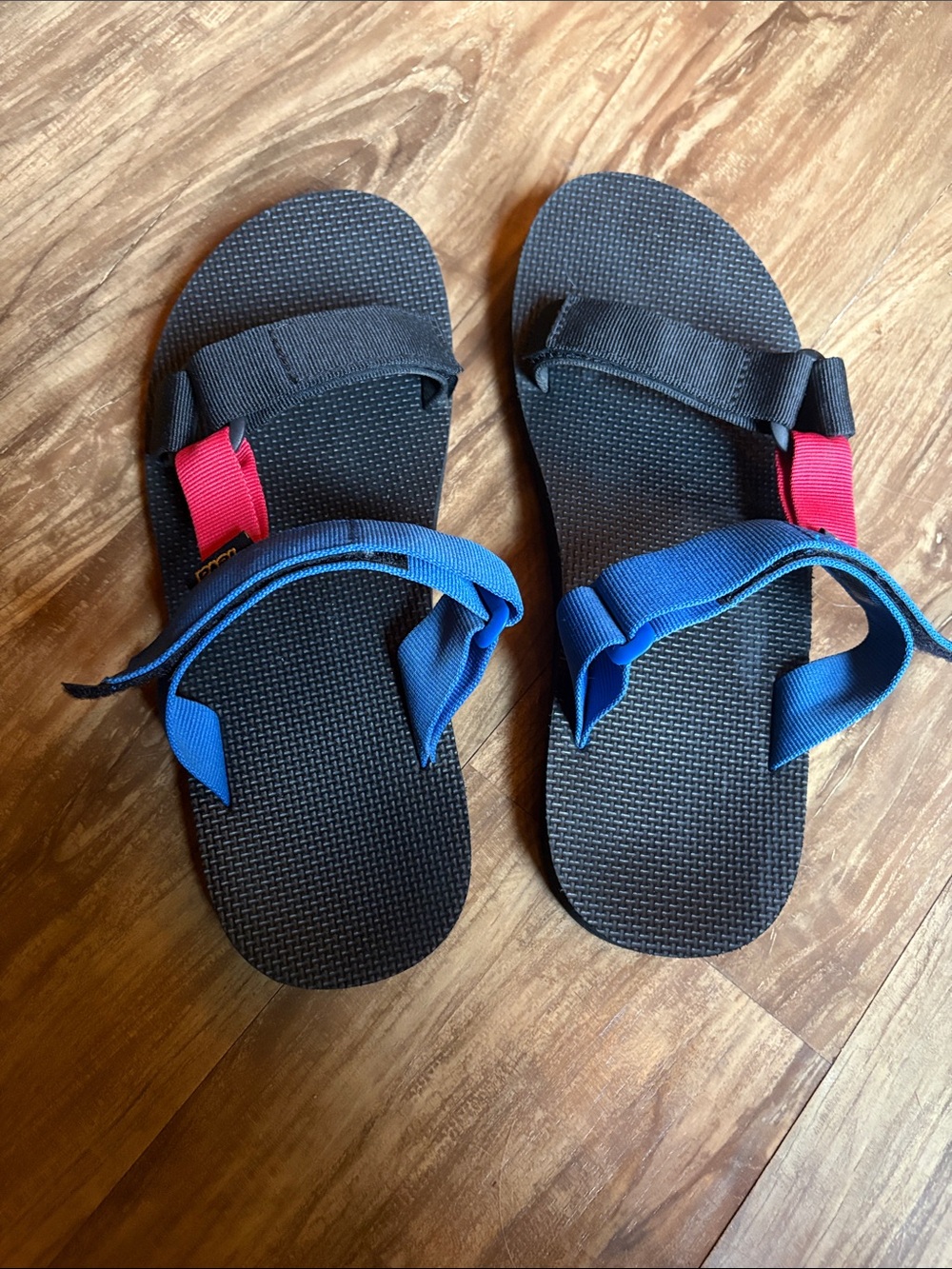 Teva Black Sandal with Blue Strap and Red Accent
